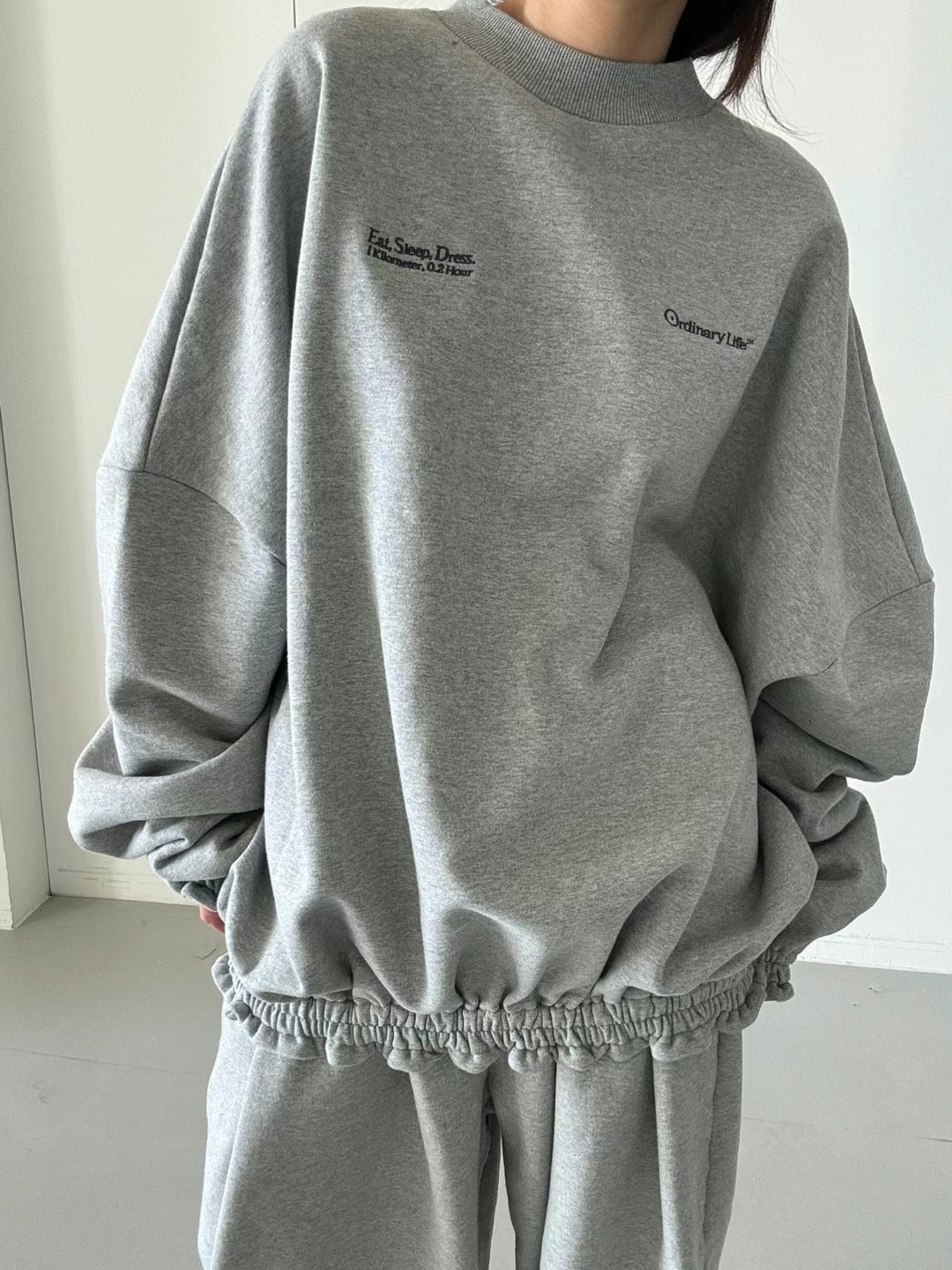 RUFFLE ENDED SWEATER