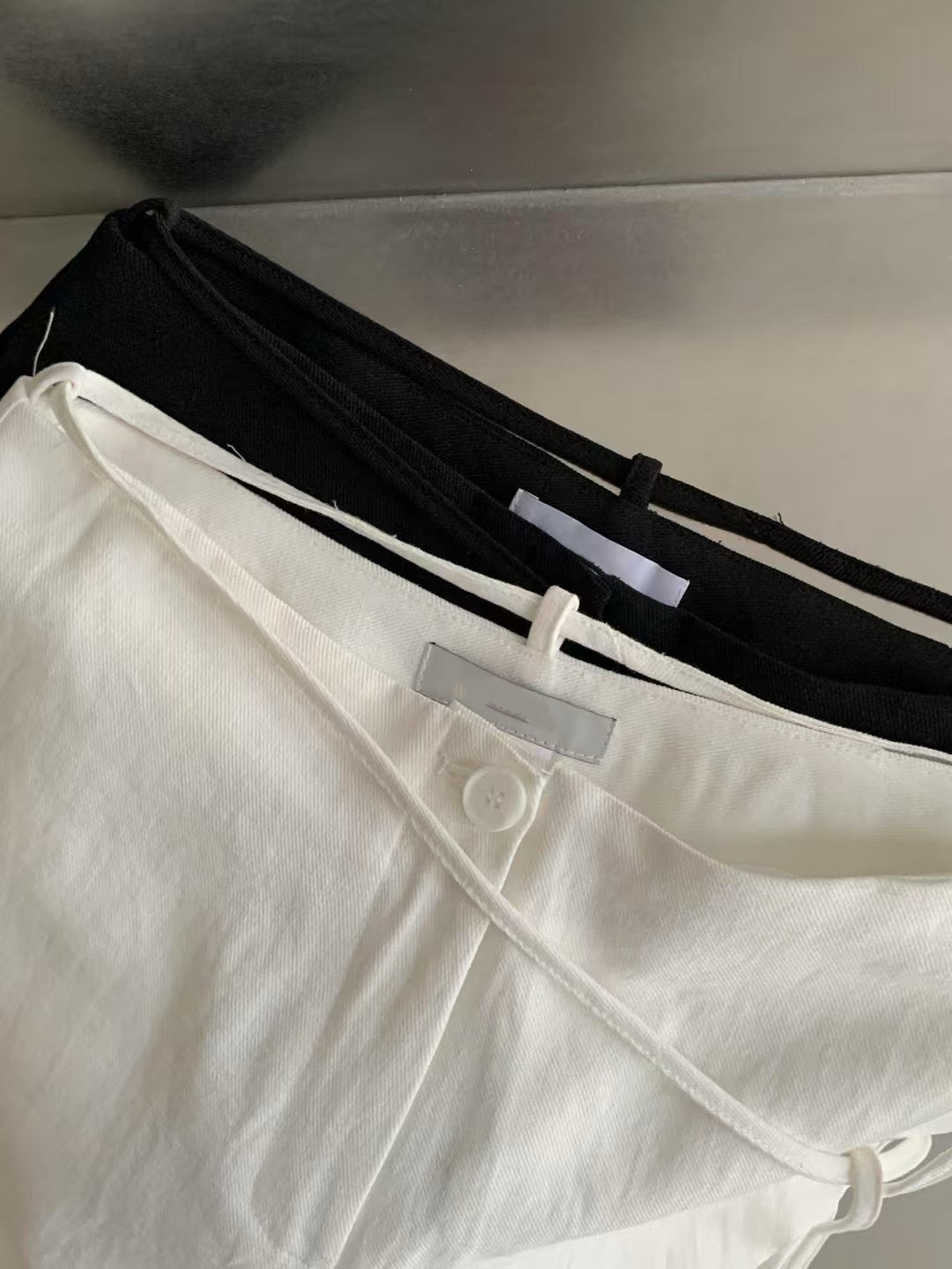 WRAPPING STRAP TWILL PANTS