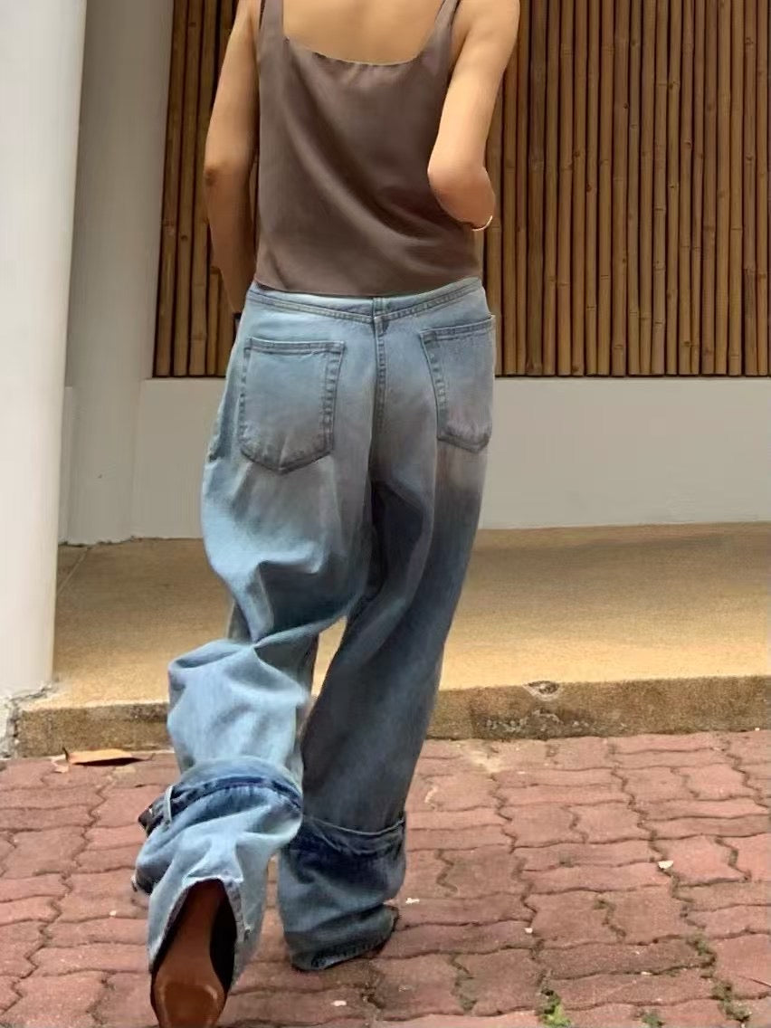 DETAILED LEG OPENING JEANS