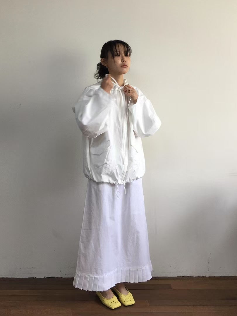 PLEAT END SKIRT